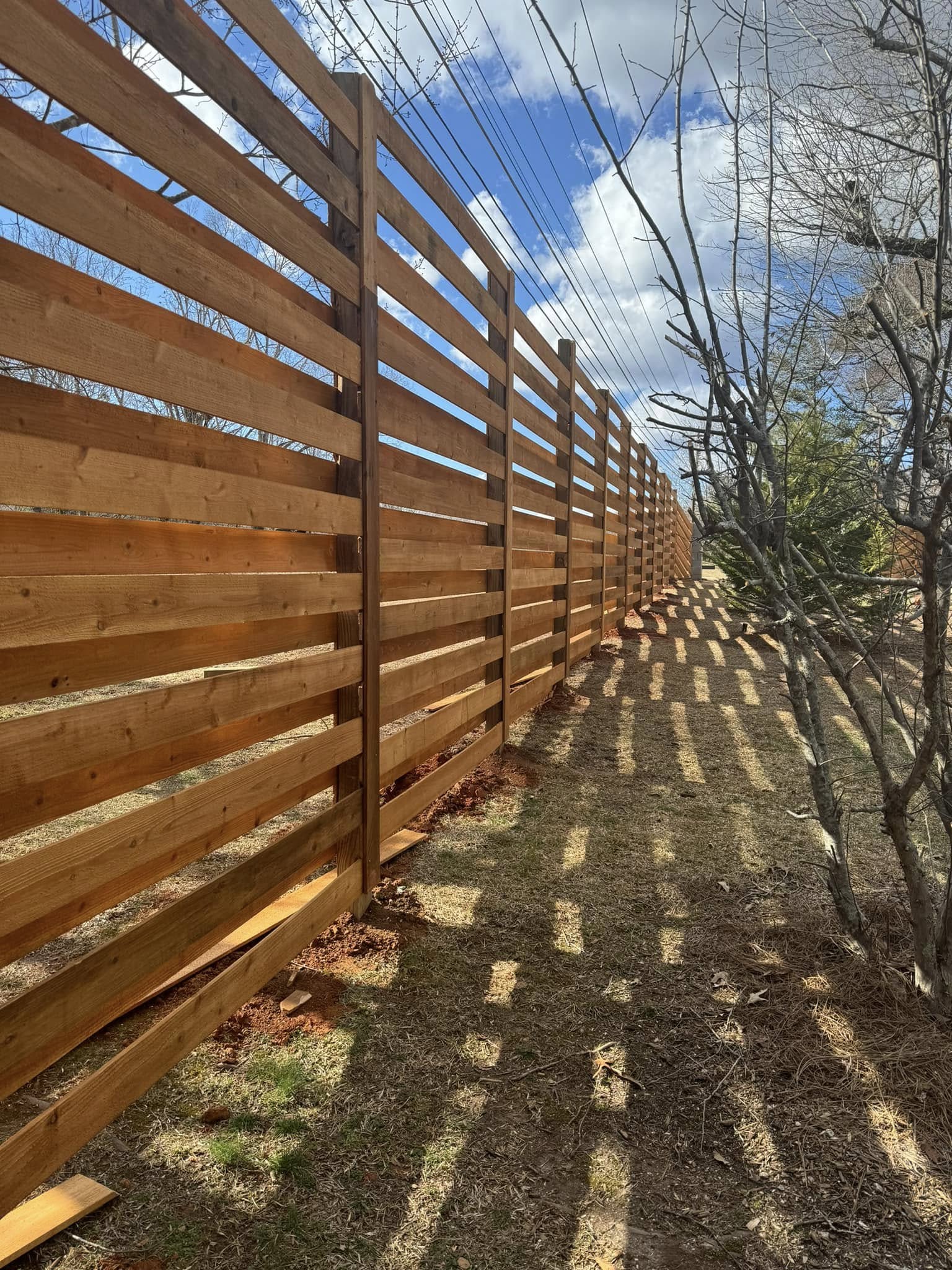 Modern cedar horizontal slat fence