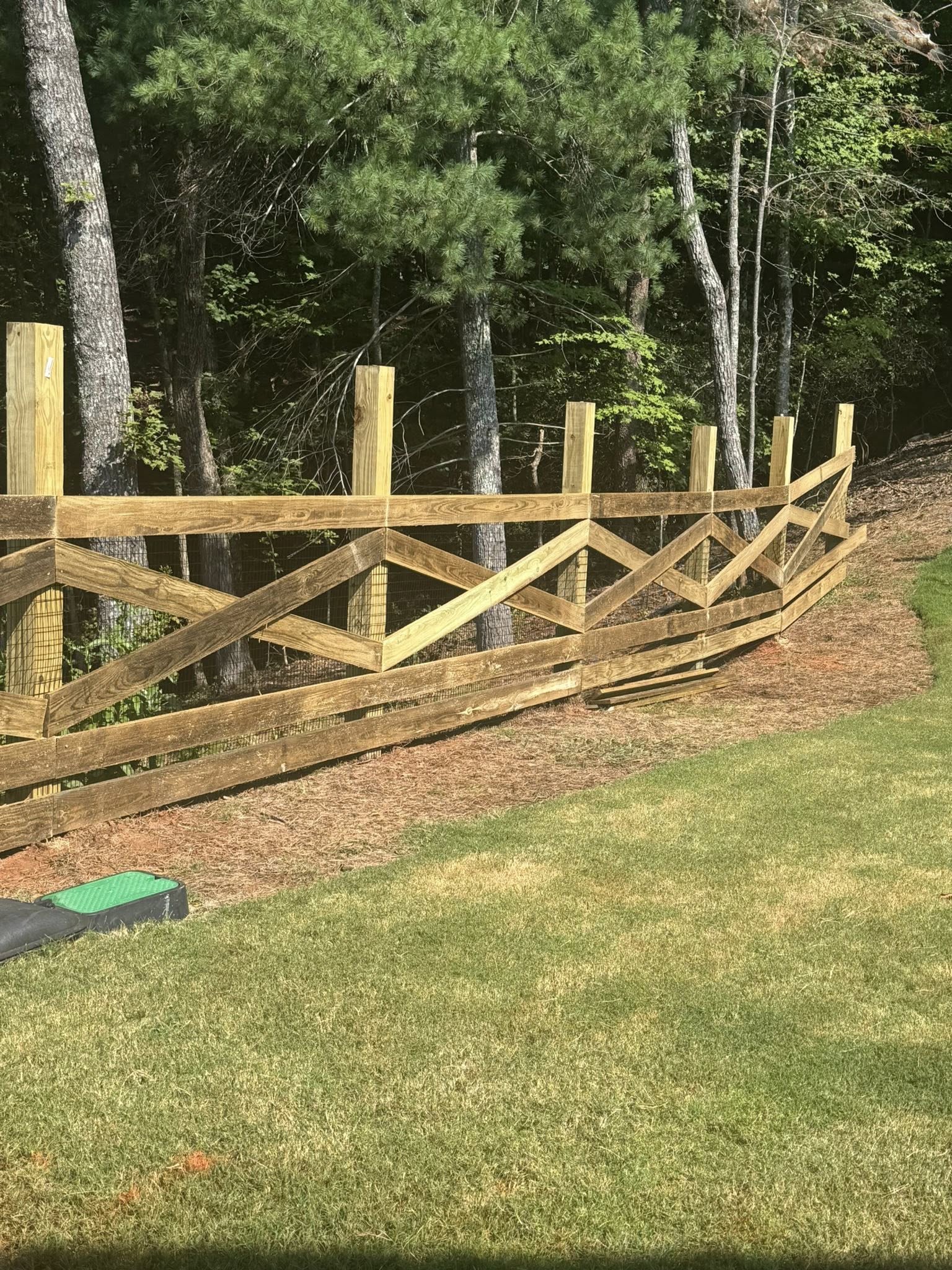 Decorative crossbuck estate fence