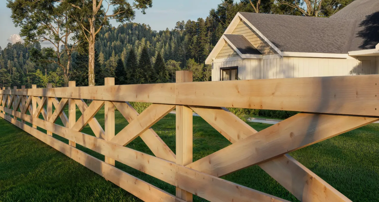 Crossbuck ranch fence with estate house