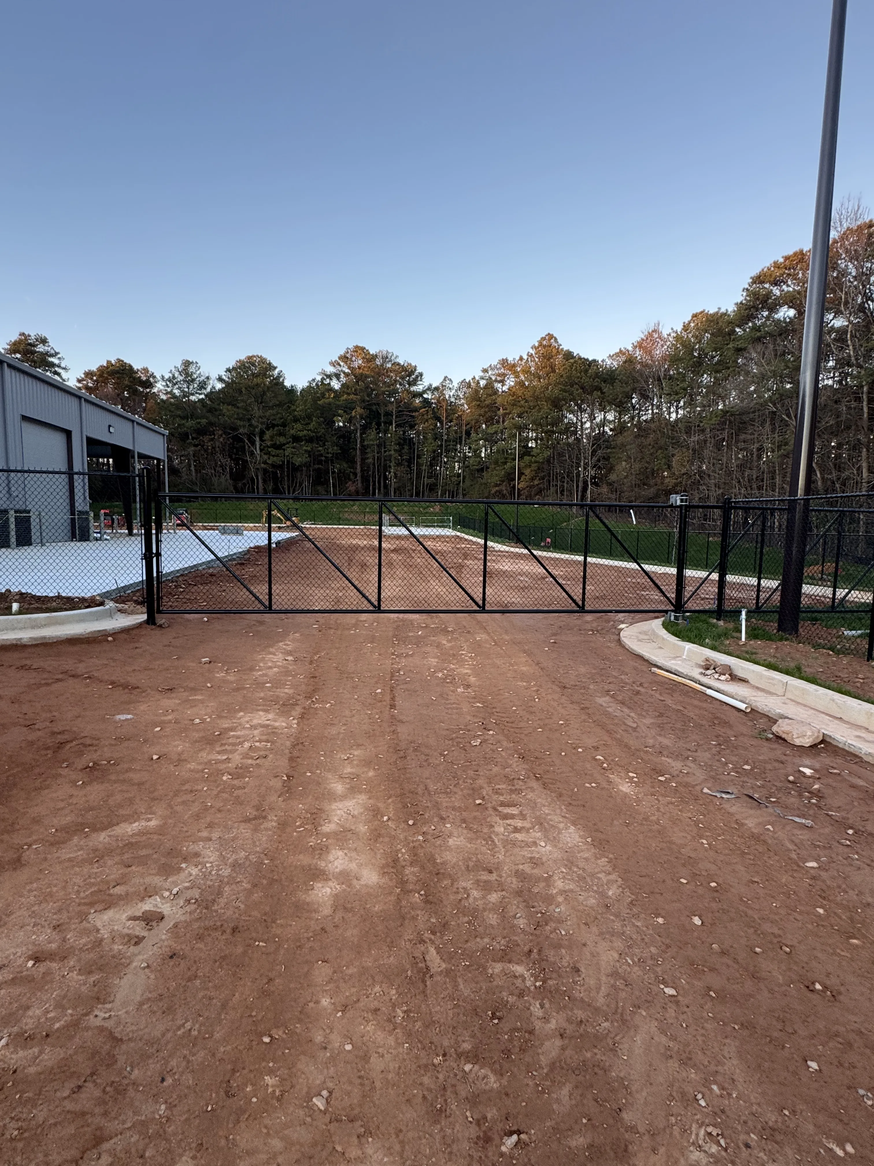 Chain link backstop for sports field