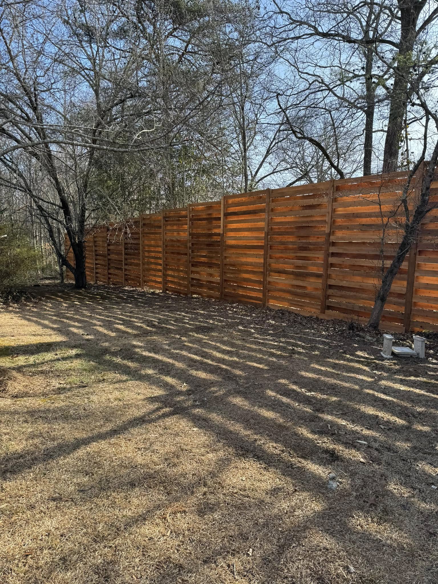Cedar horizontal slat fence long run