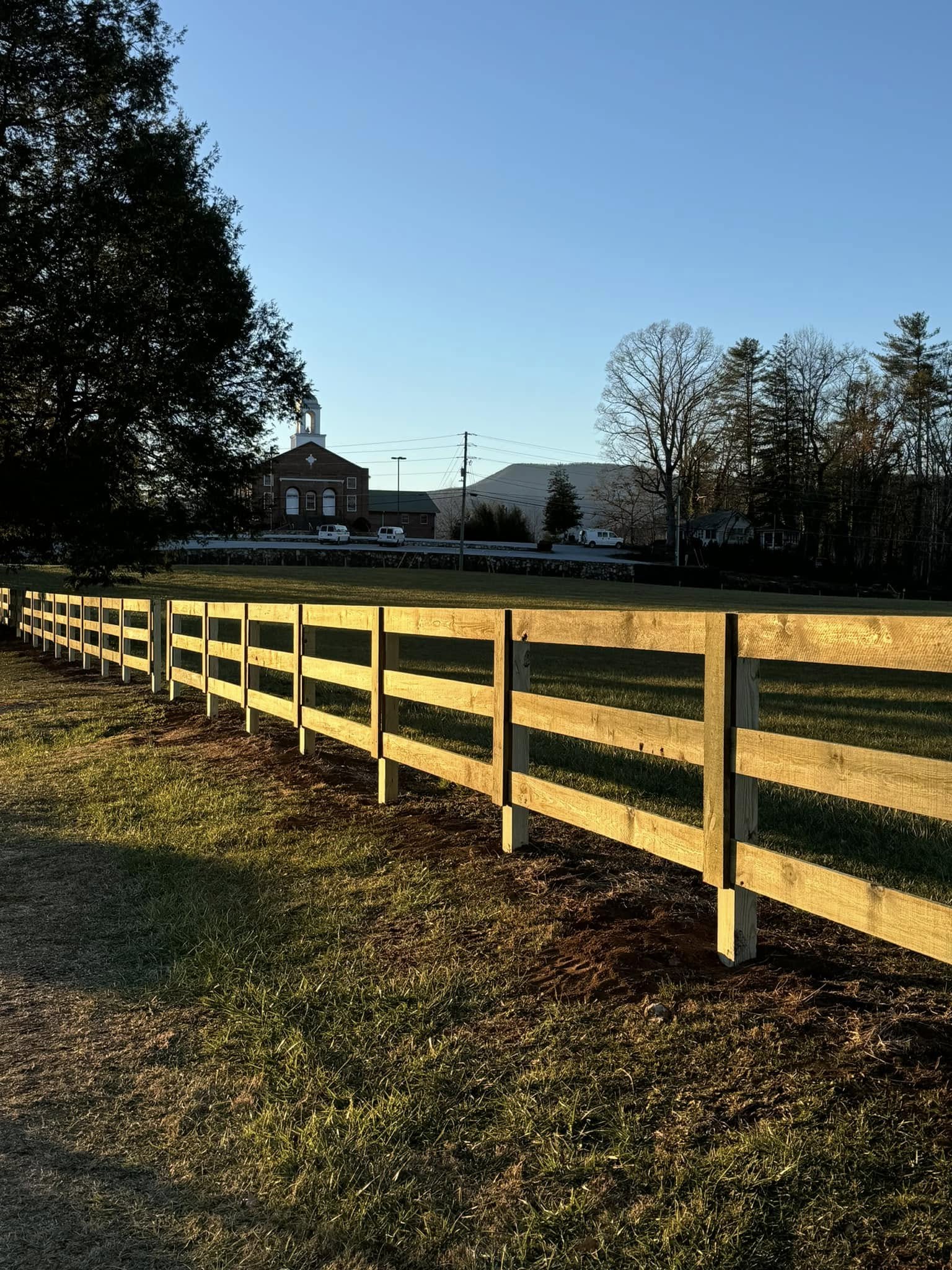 Wood ranch fence at golden hour